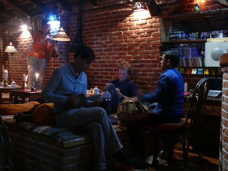 Guests and musicians enjoying a music session at Peace Eye Guest House